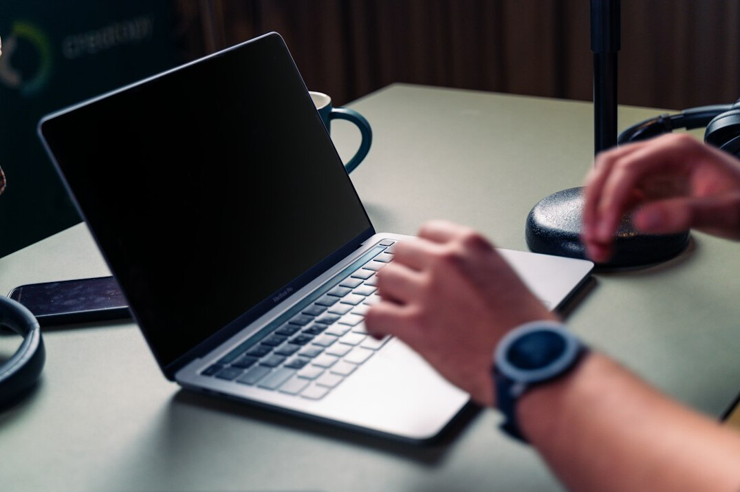 mystery writer at laptop